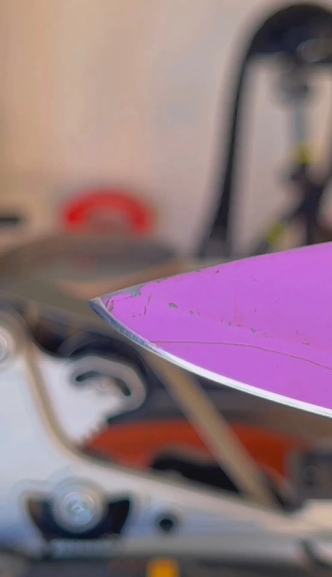 Close-up of the same pink knife with a clean repaired edge